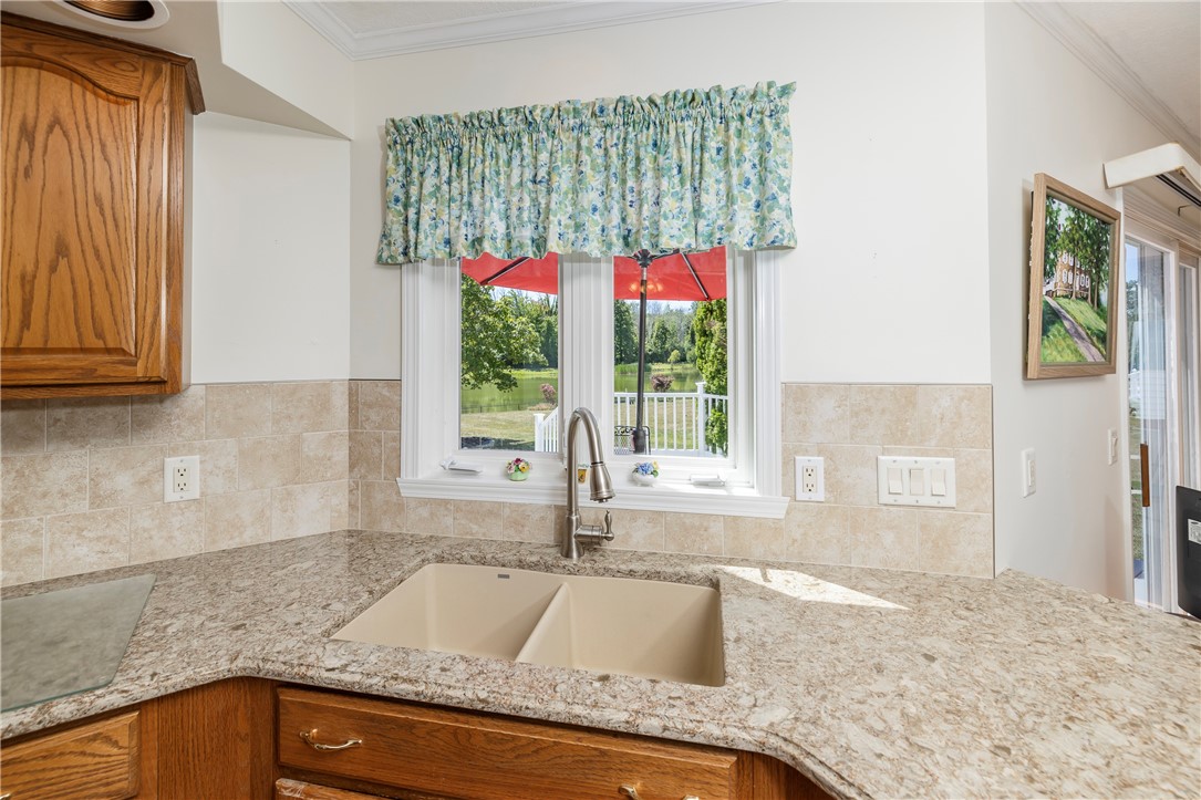 85 Sotheby Drive Greece, NY 14626 - Photo 21 of 50 BEAUTIFUL POND VIEWS FROM KITCHEN WINDOW