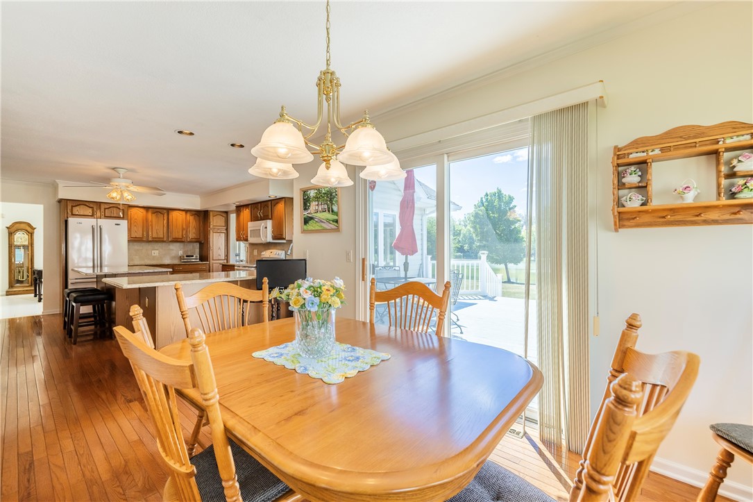 85 Sotheby Drive Greece, NY 14626 - Photo 23 of 50 DINING AREA OF KITCHEN WITH SLIDING GLASS DOOR & A