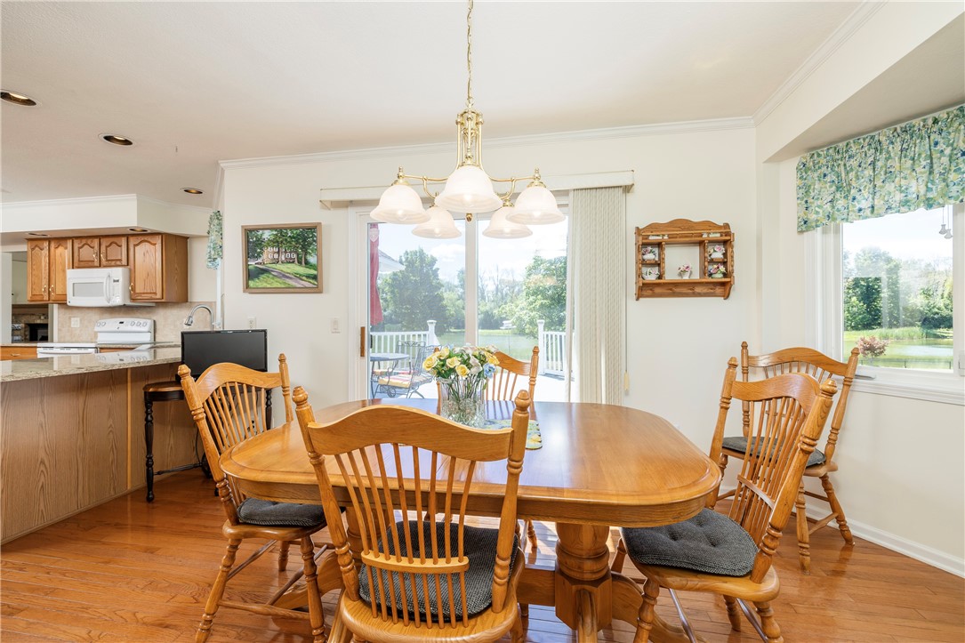 85 Sotheby Drive Greece, NY 14626 - Photo 25 of 50 POND VIEWS FROM DINING AREA OF KITCHEN