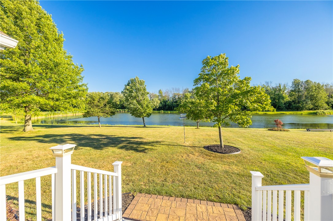 85 Sotheby Drive Greece, NY 14626 - Photo 6 of 50 ENTERTAINMENT SIZED DECK LEADING TO BACKYARD & PON