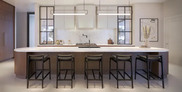 a dining table chairs sink and cabinets