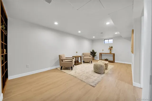 a view of a living room and dining room