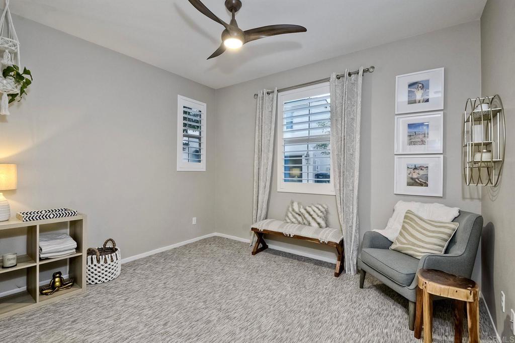 663 Gemstone Drive San Marcos, CA 92078 - Photo 16 of 38 a living room with furniture and a window