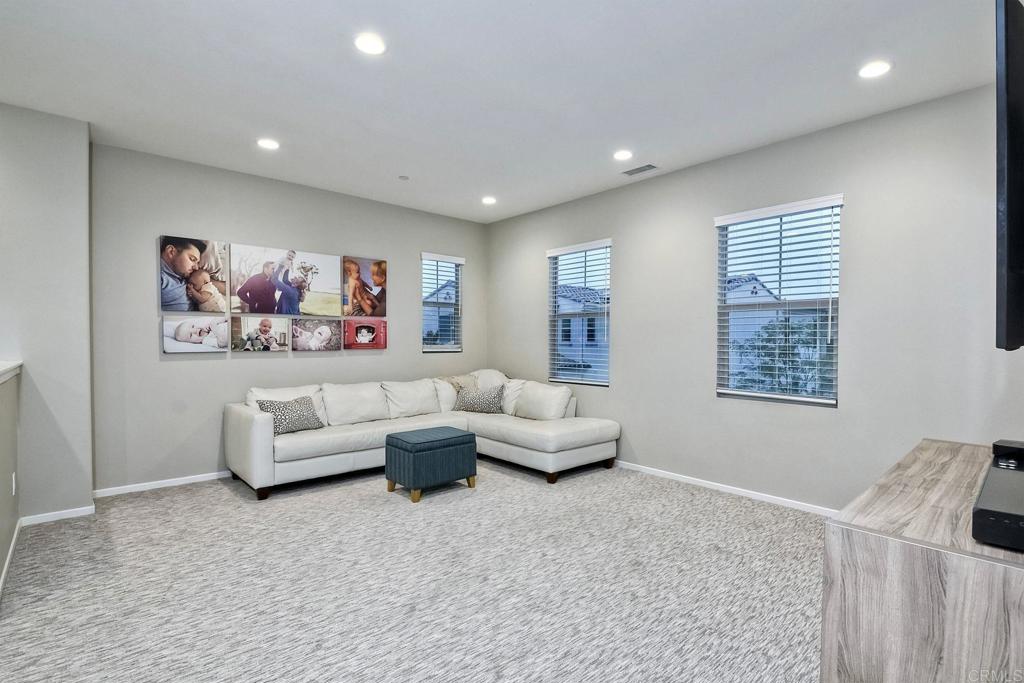 663 Gemstone Drive San Marcos, CA 92078 - Photo 17 of 38 a living room with furniture and a couch