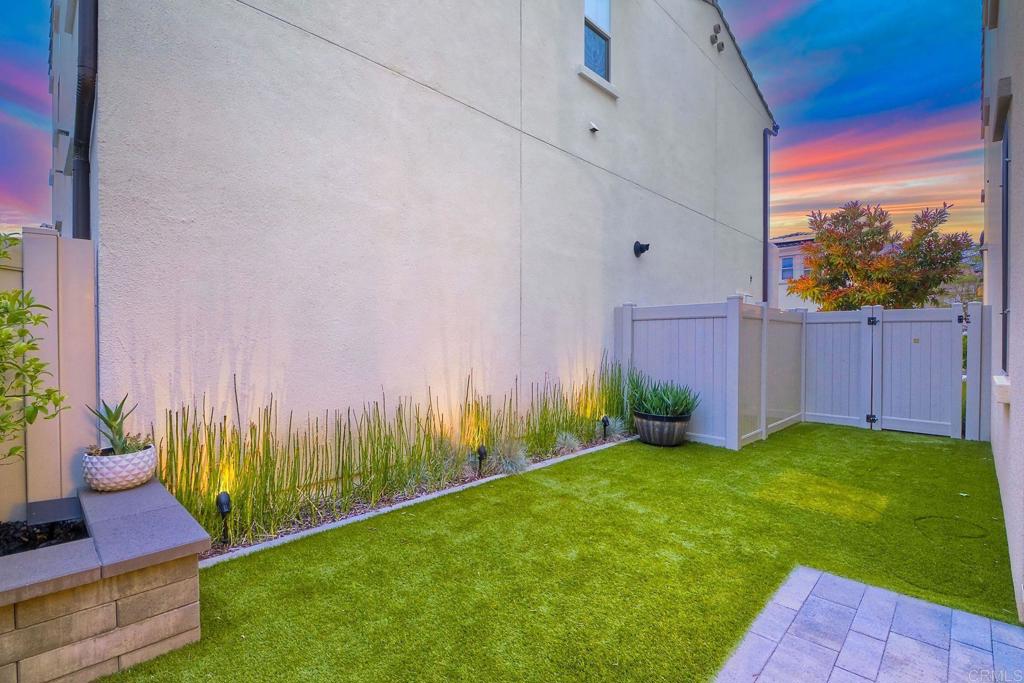 663 Gemstone Drive San Marcos, CA 92078 - Photo 29 of 38 a view of a backyard with furniture