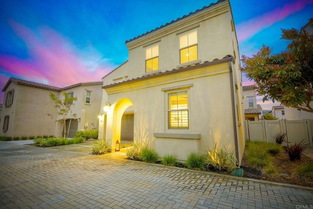 663 Gemstone Drive San Marcos, CA 92078 - Photo 3 of 38 a view of a house with a backyard