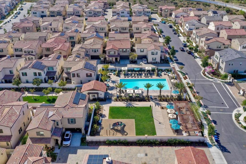 663 Gemstone Drive San Marcos, CA 92078 - Photo 35 of 38 an aerial view of multiple houses with yard