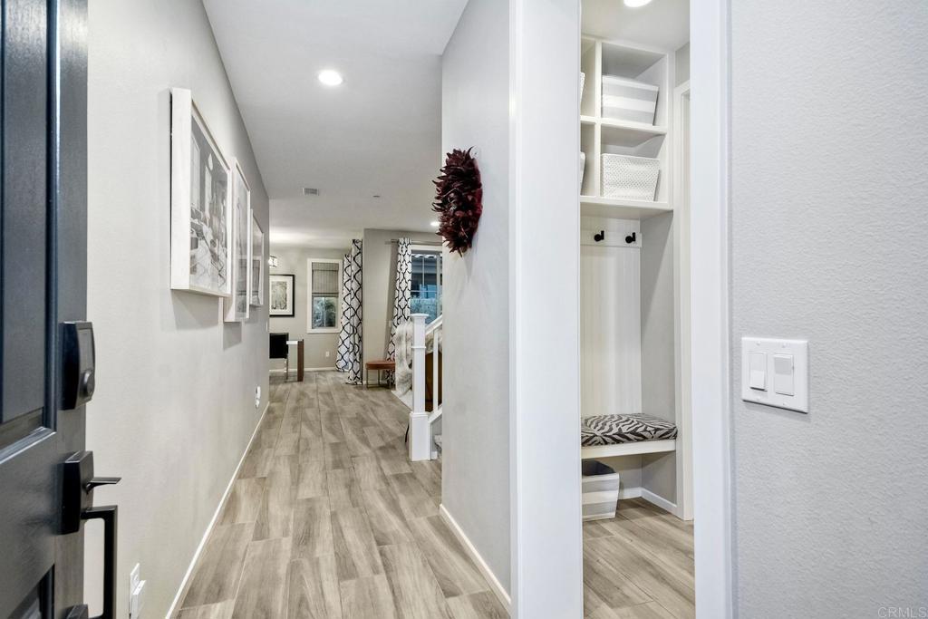 663 Gemstone Drive San Marcos, CA 92078 - Photo 8 of 38 a view of a kitchen from the hallway