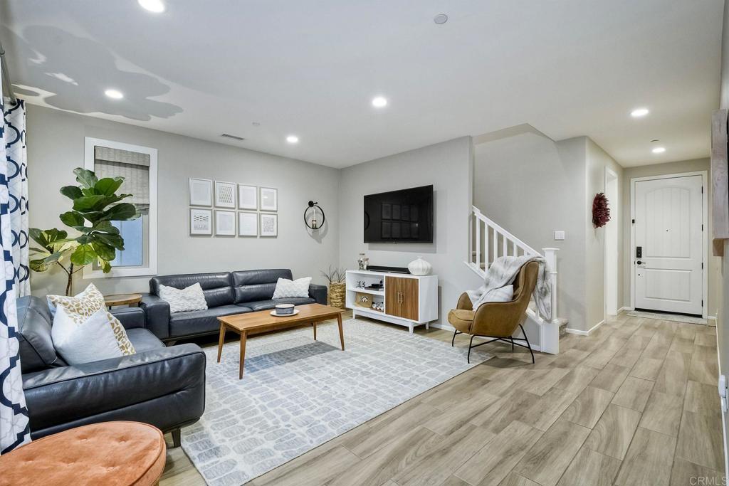 663 Gemstone Drive San Marcos, CA 92078 - Photo 9 of 38 a living room with furniture and a flat screen tv