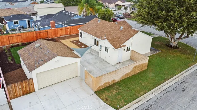 an aerial view of a house with garden