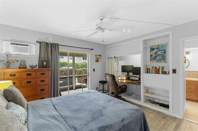 a bedroom with a bed and furniture