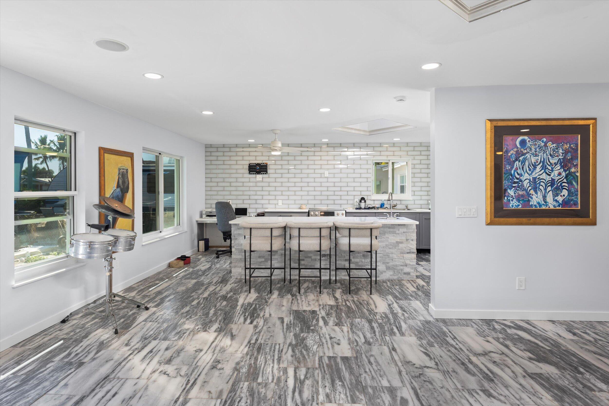 2924 Riviera Drive Key West, FL 33040 - Photo 26 of 43 a living room with furniture and a wooden floor