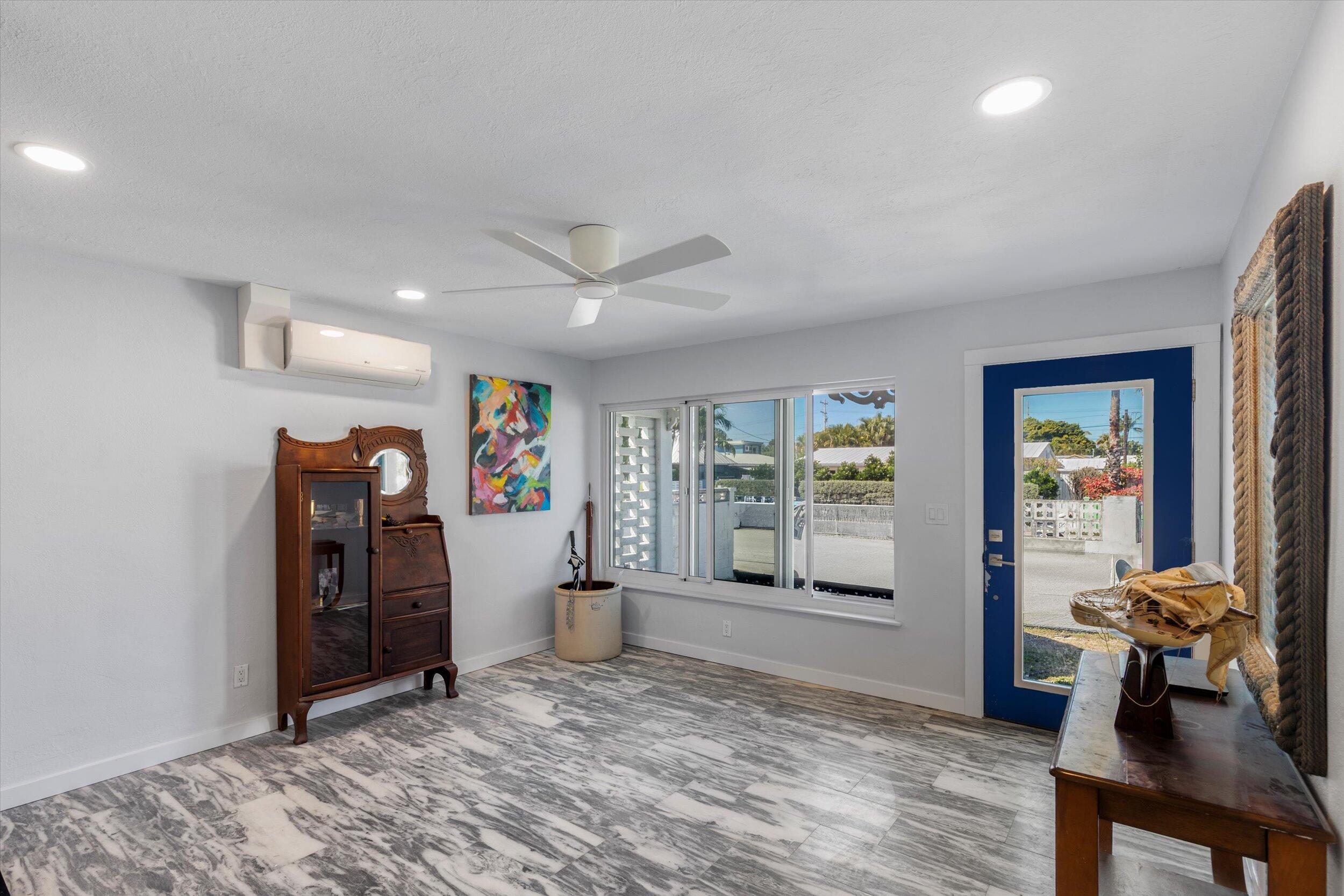 2924 Riviera Drive Key West, FL 33040 - Photo 3 of 43 a view of a livingroom with furniture and windows