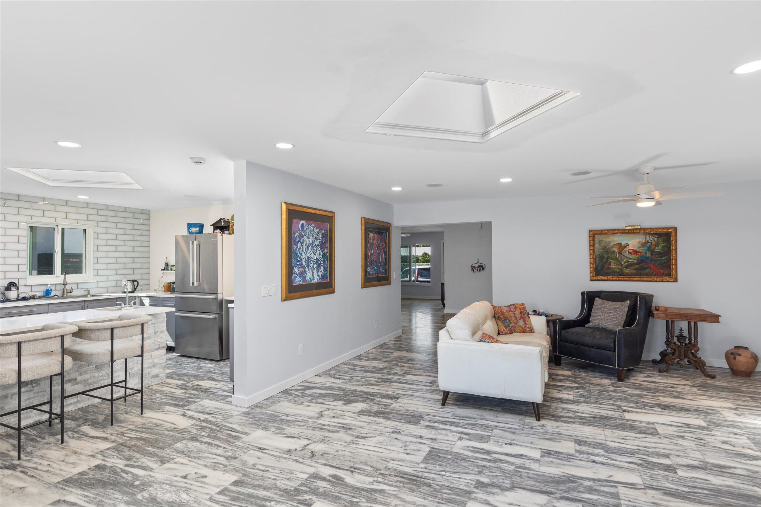 2924 Riviera Drive Key West, FL 33040 - Photo 31 of 43 a living room with furniture and a wooden floor
