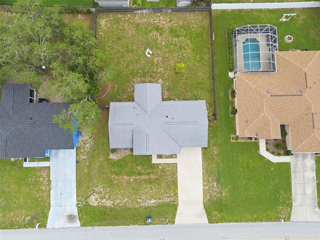 2202 Godfrey Avenue Spring Hill, FL 34609 - Photo 35 of 36 an aerial view of a house with a yard