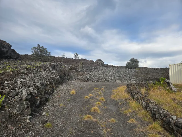 a view of a lake with mountains in the background