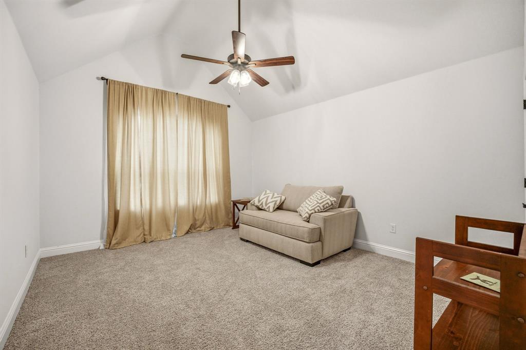 3024 Reed Court Granbury, TX 76048 - Photo 25 of 40 a living room with furniture and a window