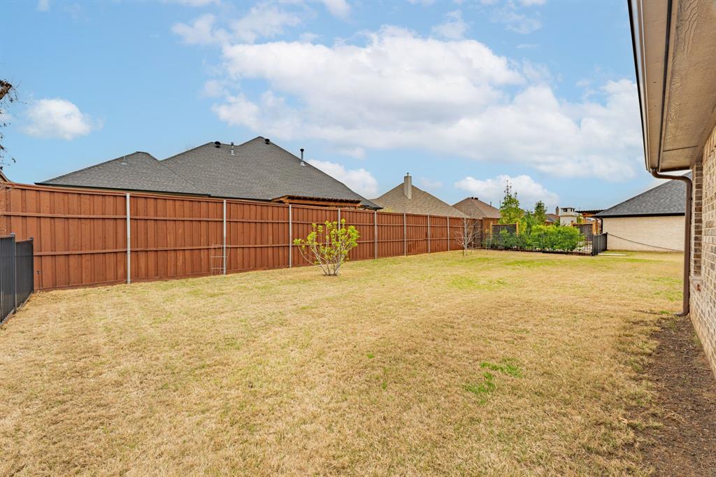 3024 Reed Court Granbury, TX 76048 - Photo 32 of 40 a view of a backyard