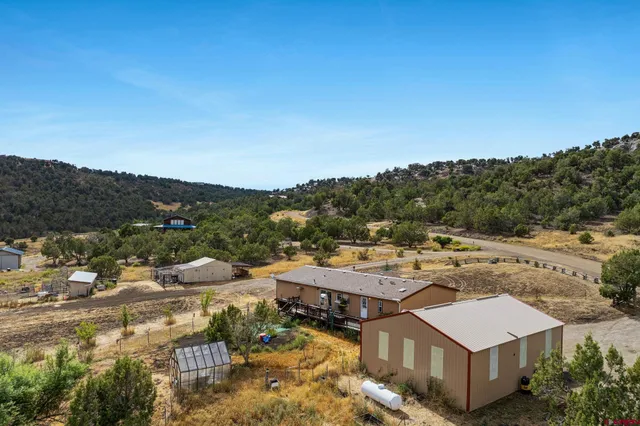 a view of a city with mountains in the background