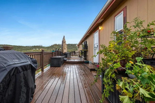 a view of roof deck with patio