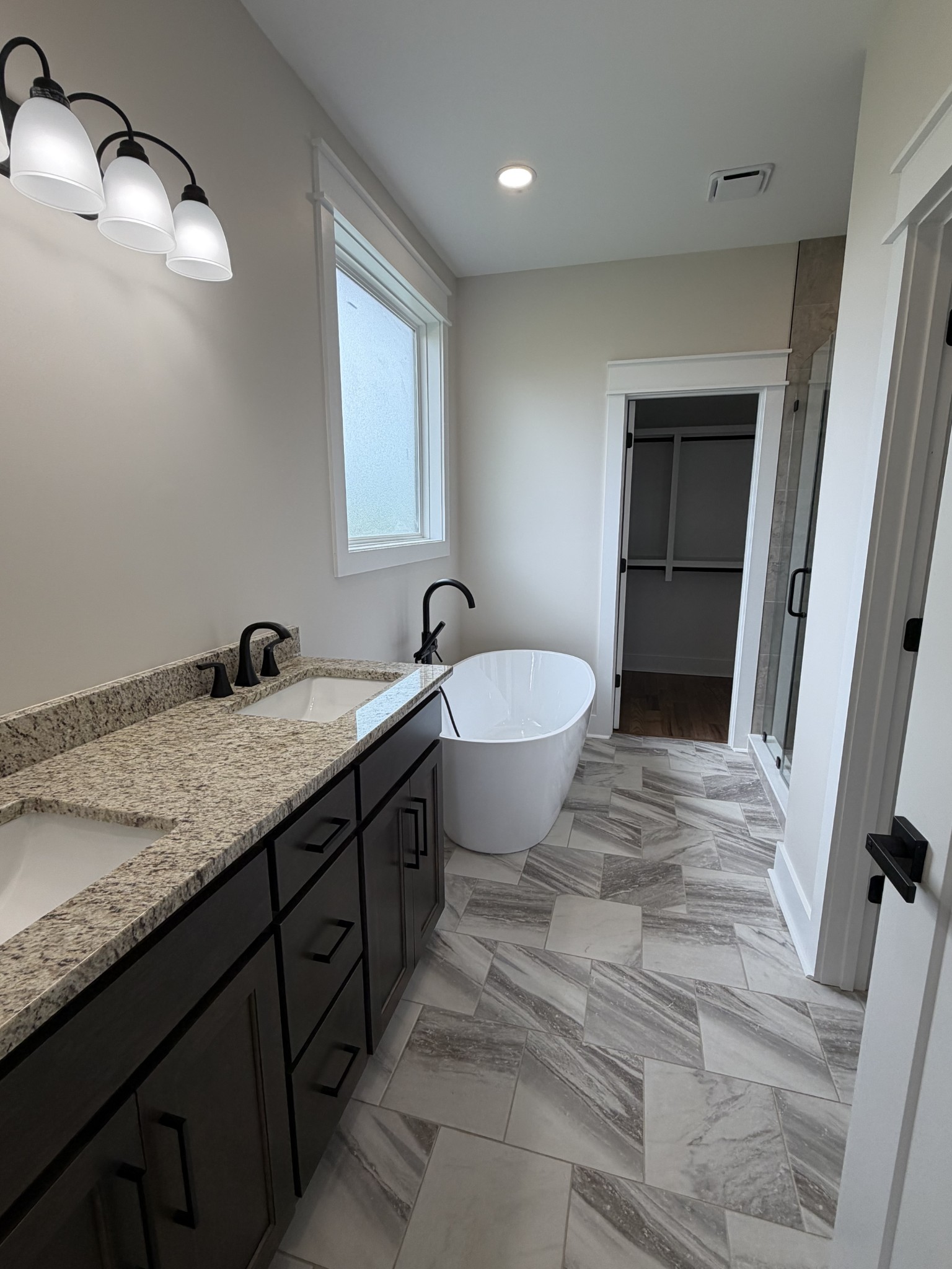 1258 Tom Grissom Road Morrison, TN 37357 - Photo 7 of 8 a bathroom with a granite countertop sink toilet and shower