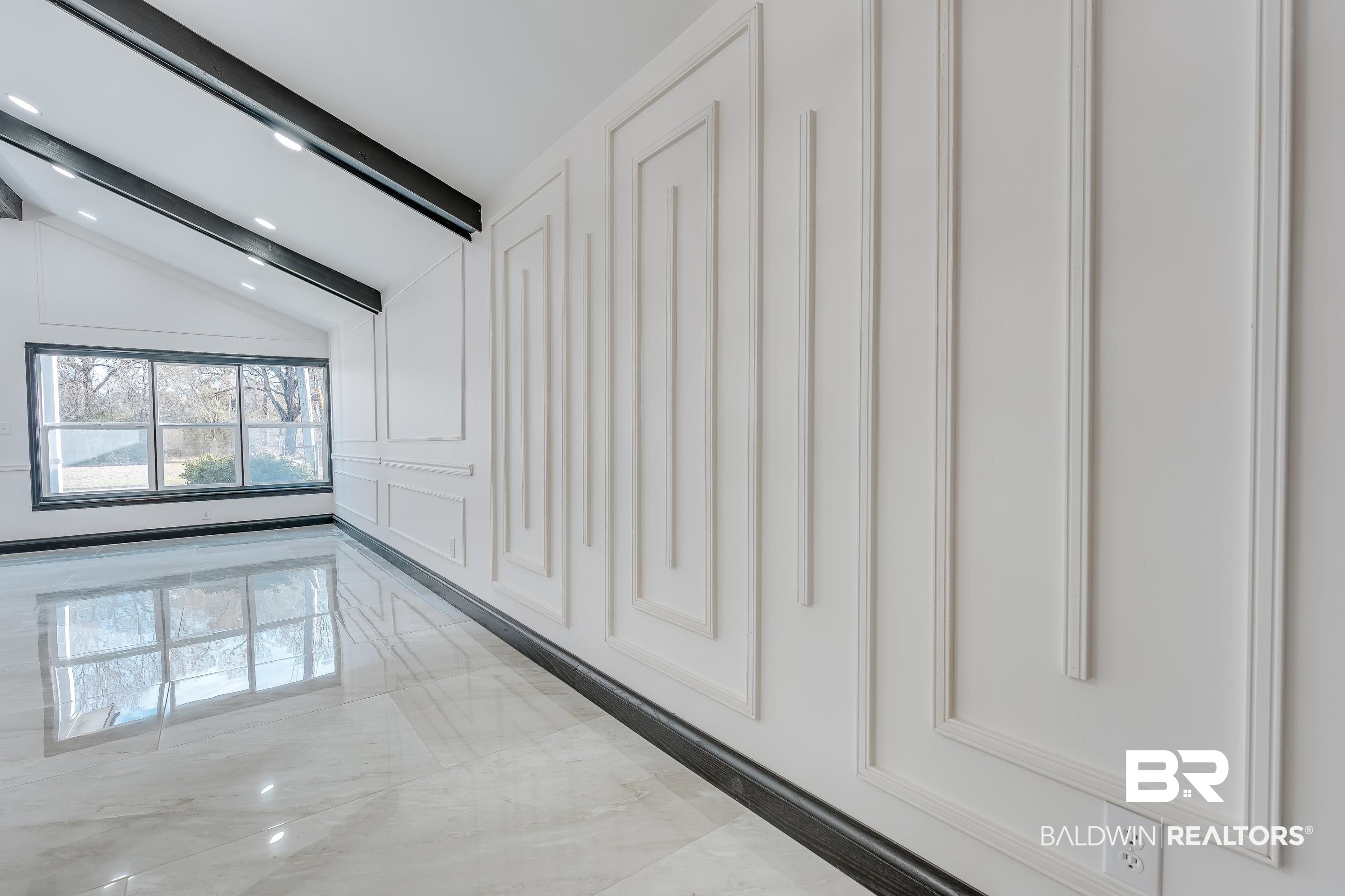 1190 Military Road Mount Vernon, AL 36560 - Photo 36 of 47 Hall with light marble finish floors and a decorative wall