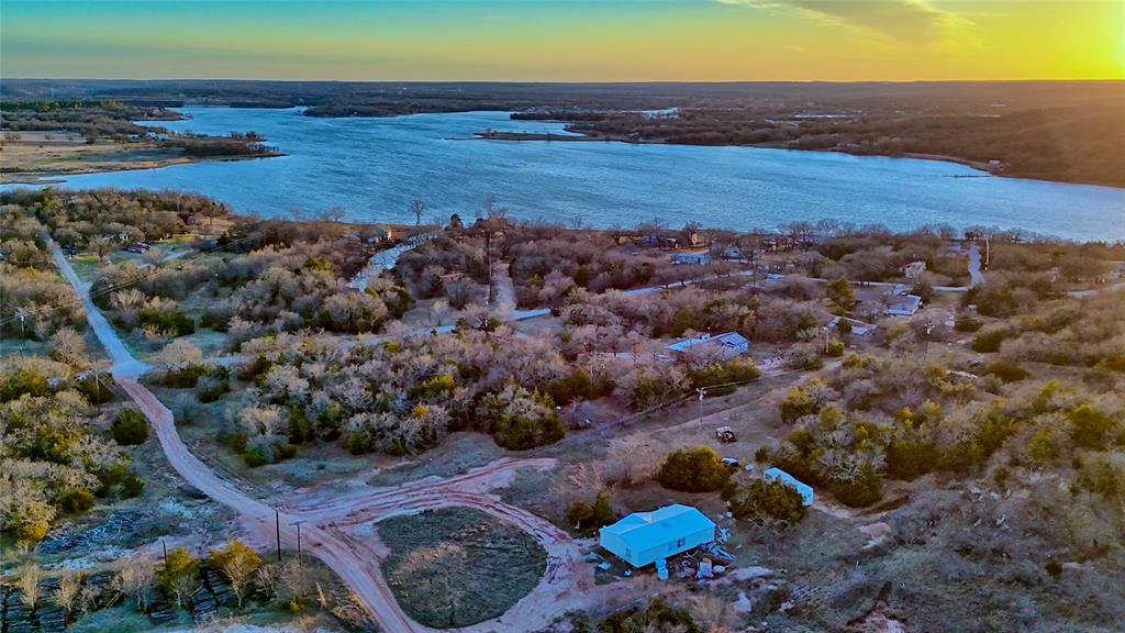 858 Ford Road Bowie, TX 76230 - Photo 32 of 40 a view of an ocean and beach