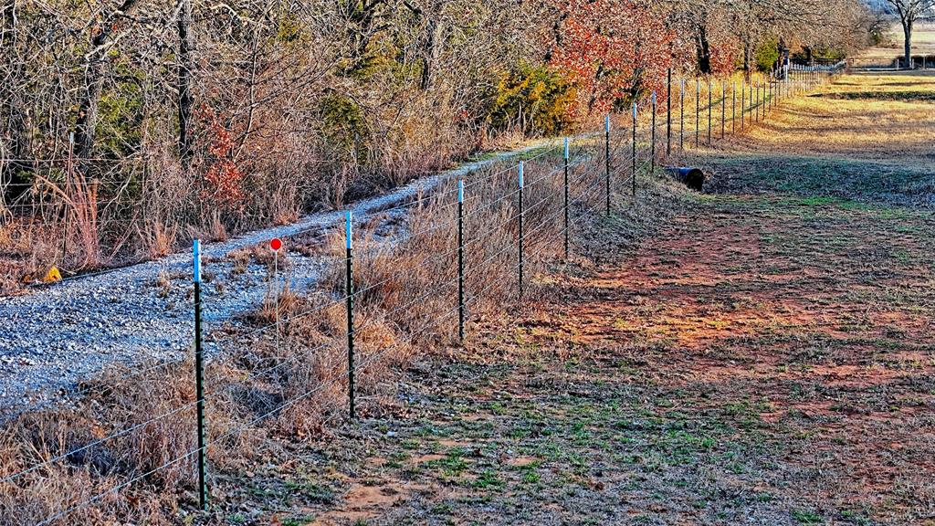 858 Ford Road Bowie, TX 76230 - Photo 39 of 40 a view of a pathway with a yard
