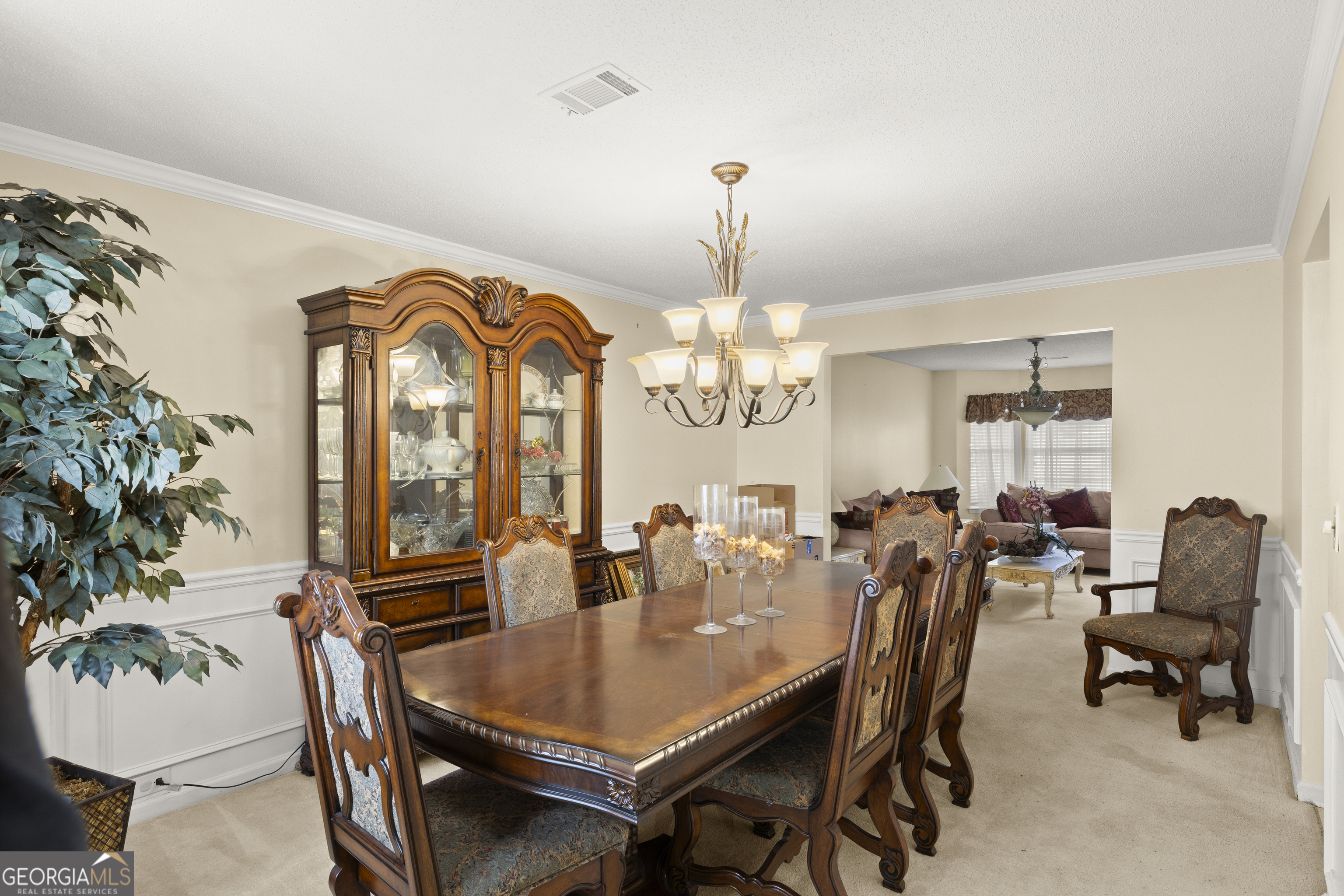 11961 Markham Way Hampton, GA 30228 - Photo 12 of 49 a view of a dining room with furniture window and wooden floor