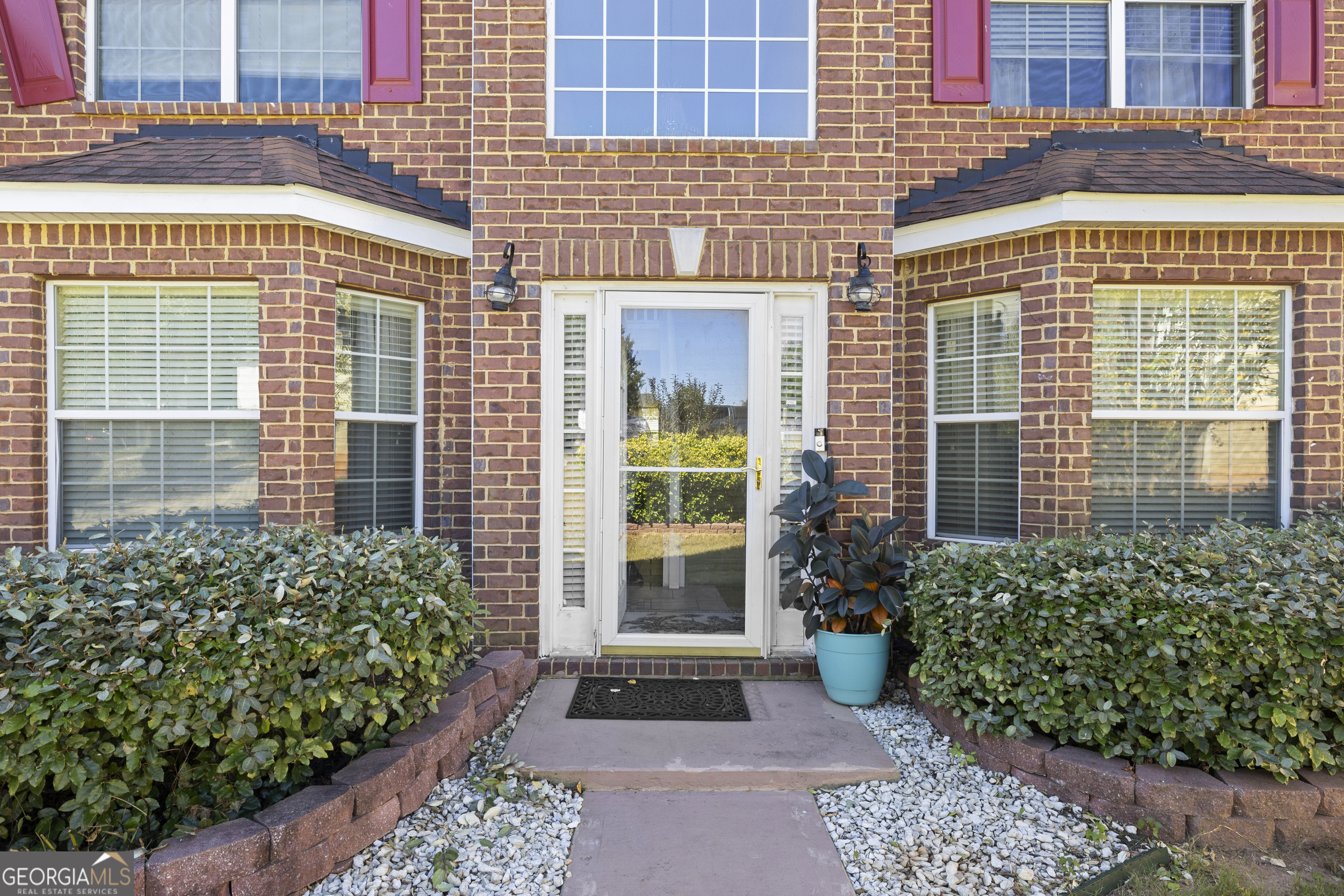 11961 Markham Way Hampton, GA 30228 - Photo 2 of 49 a front view of a house