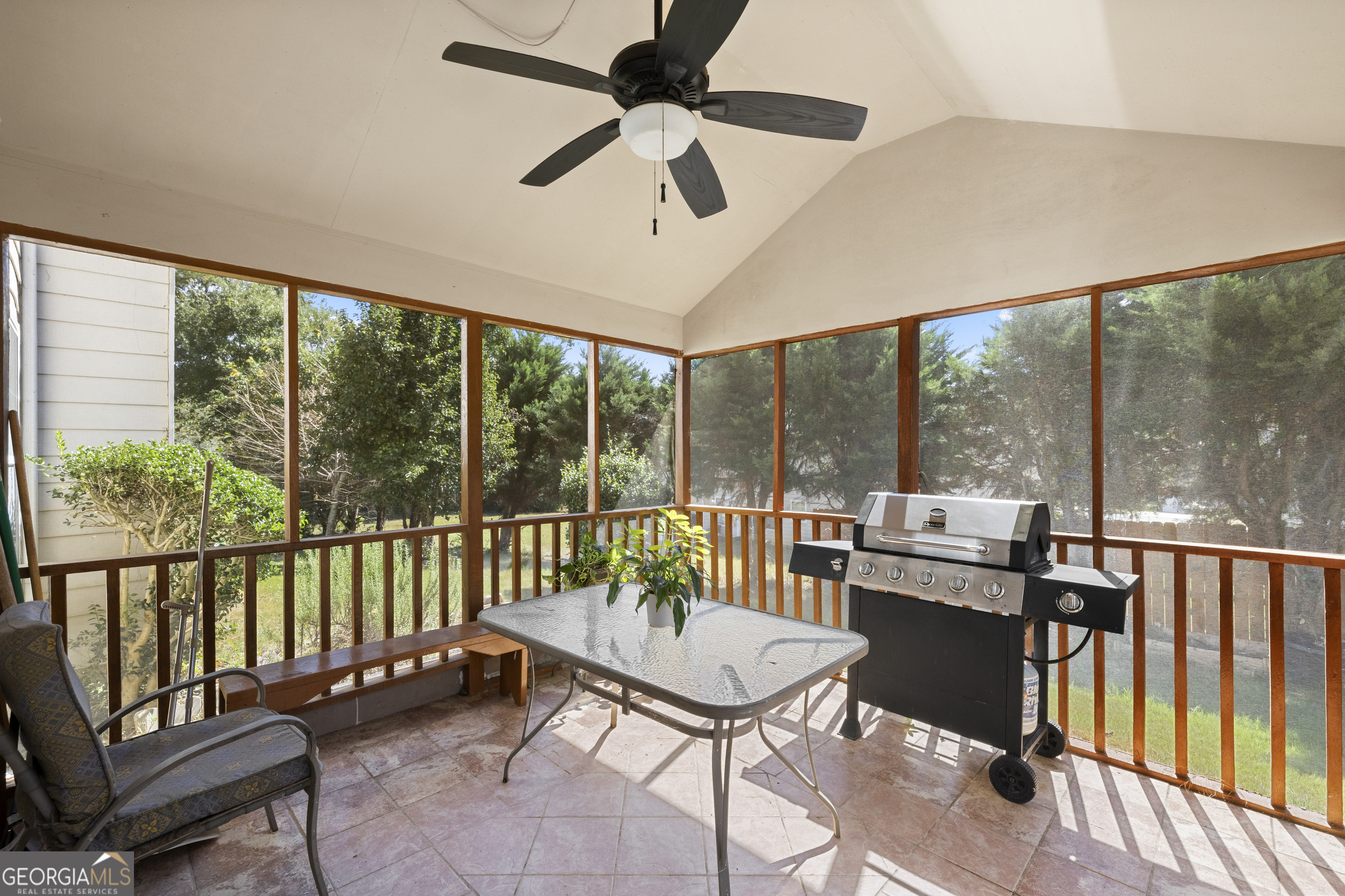 11961 Markham Way Hampton, GA 30228 - Photo 44 of 49 a balcony with furniture and a potted plant