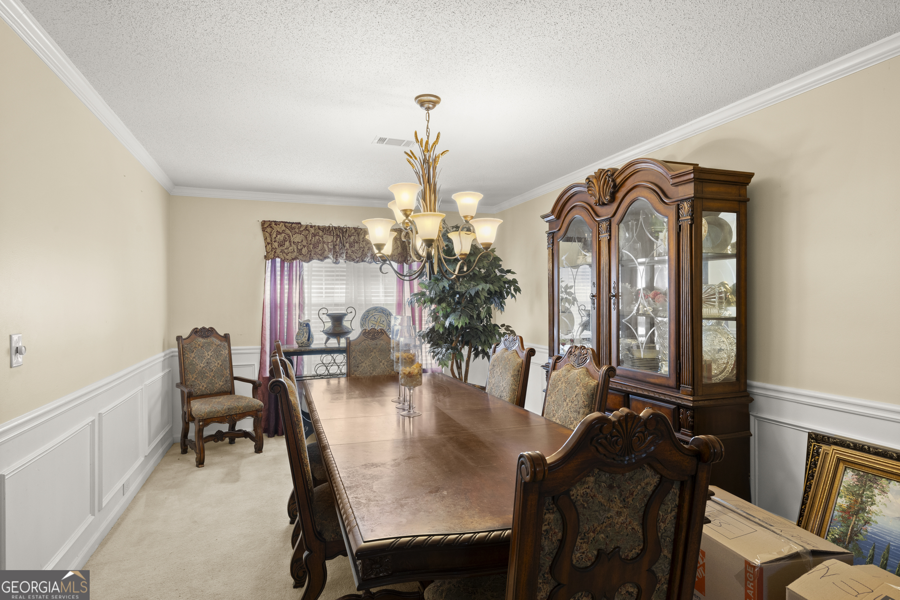 11961 Markham Way Hampton, GA 30228 - Photo 10 of 49 a view of a dining room with furniture and chandelier