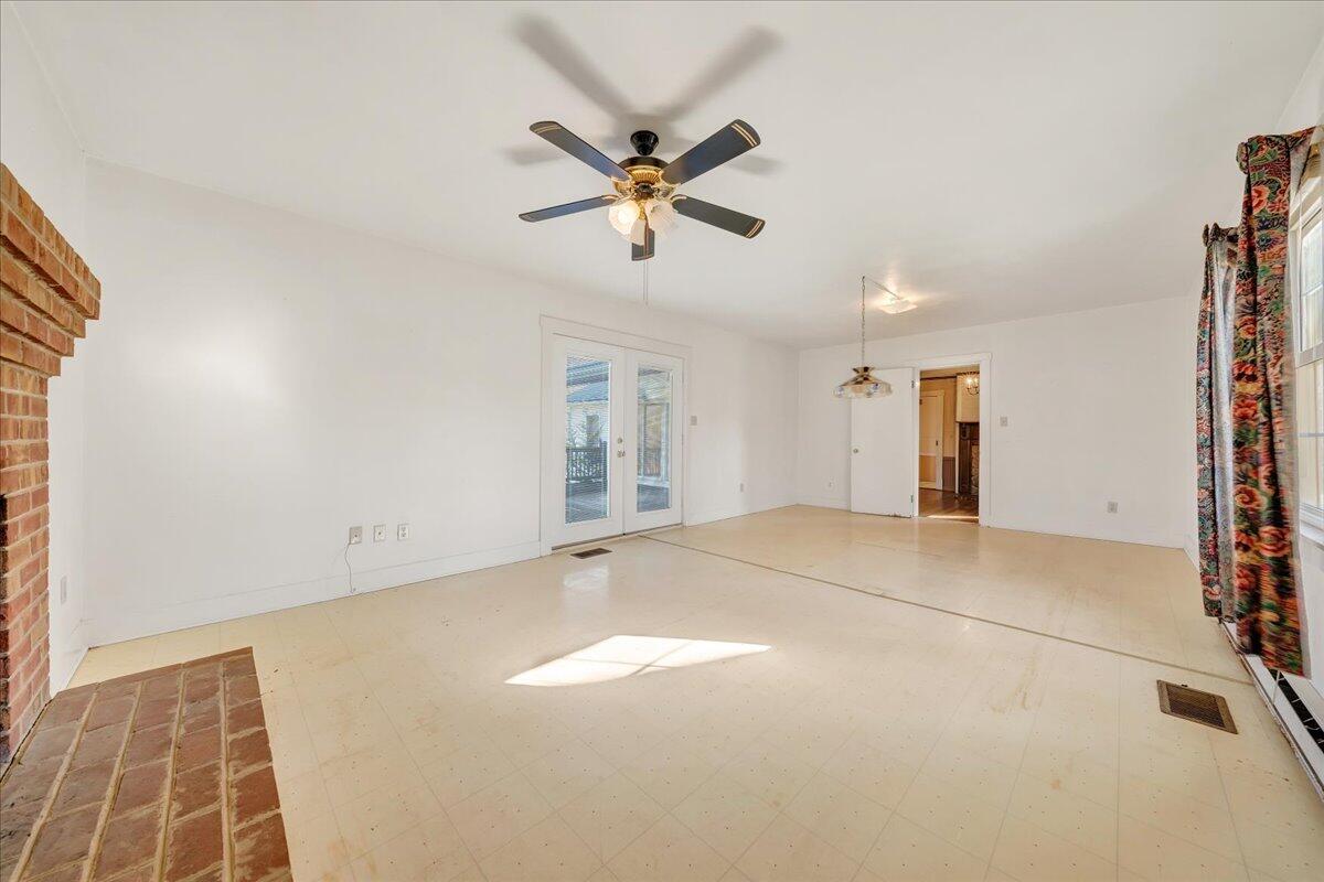 1391 Deep Woods Road Hardy, VA 24101 - Photo 24 of 43 a view of a livingroom with a ceiling fan and window