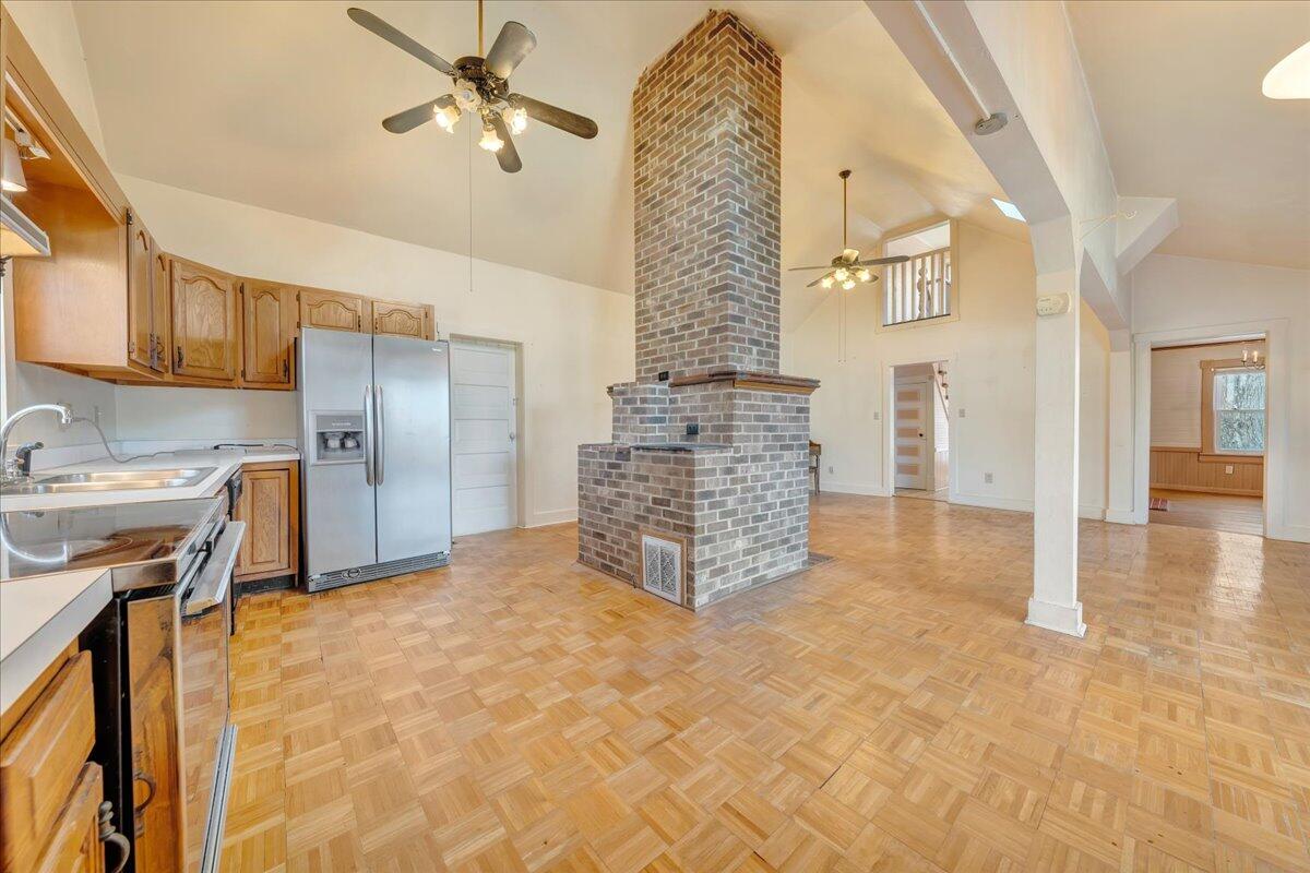 1391 Deep Woods Road Hardy, VA 24101 - Photo 27 of 43 a view of kitchen with stainless steel appliances cabinets and wooden floor