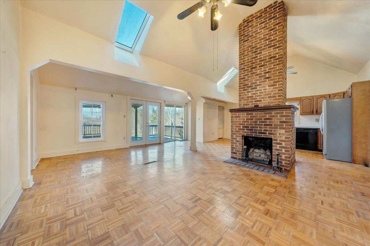 1391 Deep Woods Road Hardy, VA 24101 - Photo 30 of 43 a view of livingroom with fireplace and window