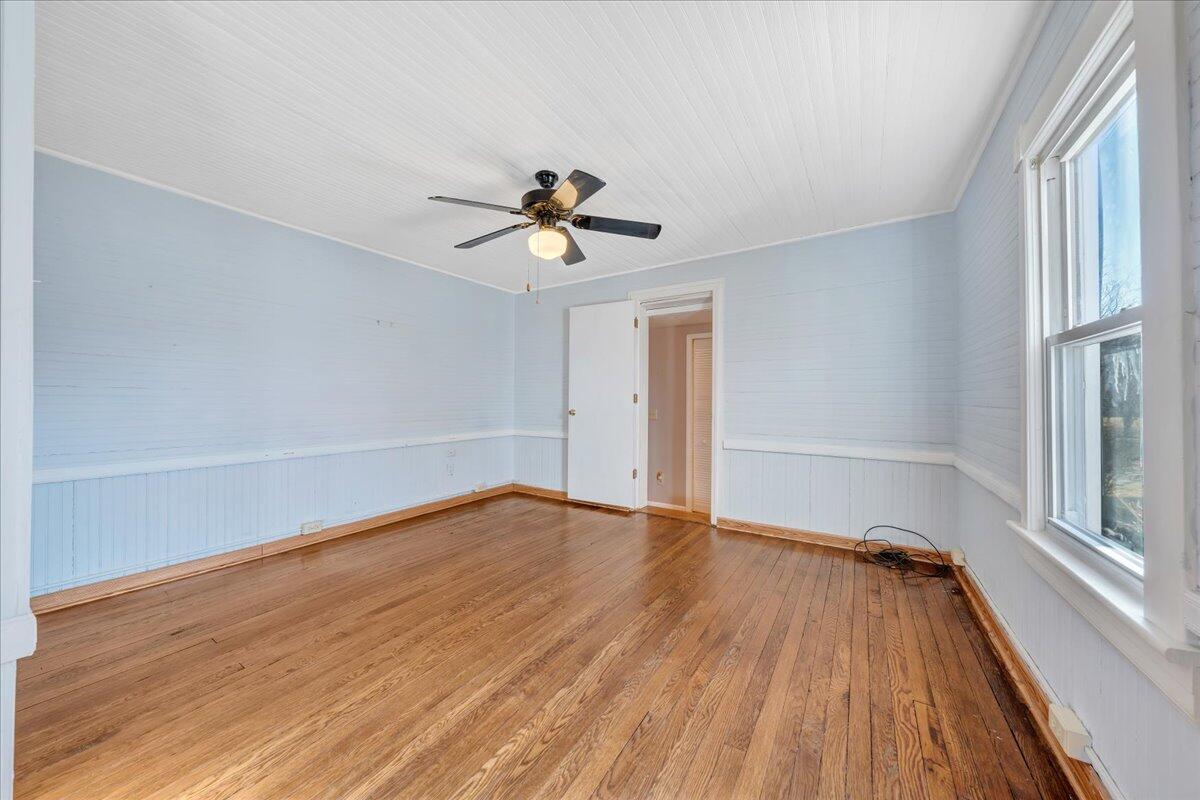 1391 Deep Woods Road Hardy, VA 24101 - Photo 34 of 43 wooden floor in an empty room with a window