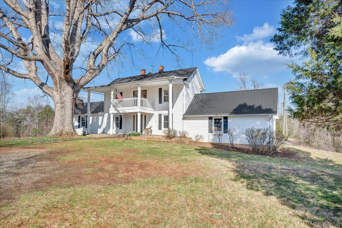 1391 Deep Woods Road Hardy, VA 24101 - Photo 4 of 43 front view of a house with a big yard