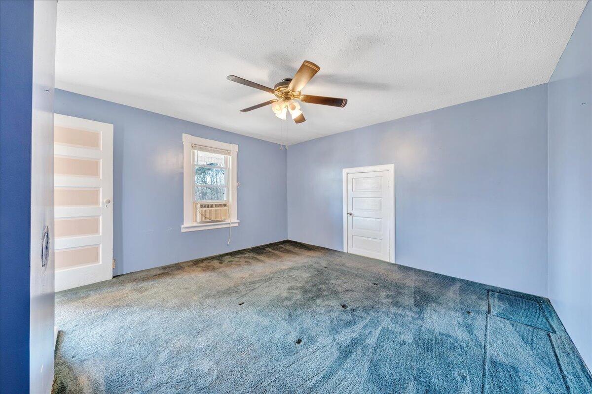 1391 Deep Woods Road Hardy, VA 24101 - Photo 41 of 43 wooden floor in an empty room with a window