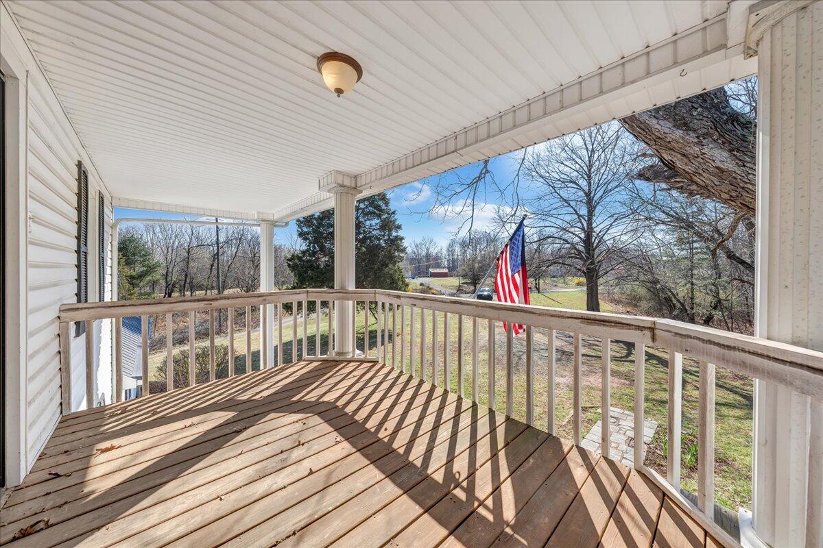 1391 Deep Woods Road Hardy, VA 24101 - Photo 42 of 43 a view of balcony with wooden floor and fence