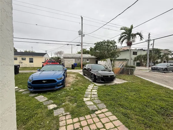 a house view with a garden space