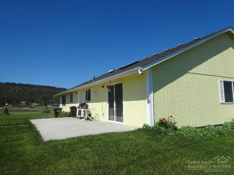 3864 Rimrock Acres Loop Prineville, OR 97754 - Photo 20 of 25 Across the back of the home and the pati