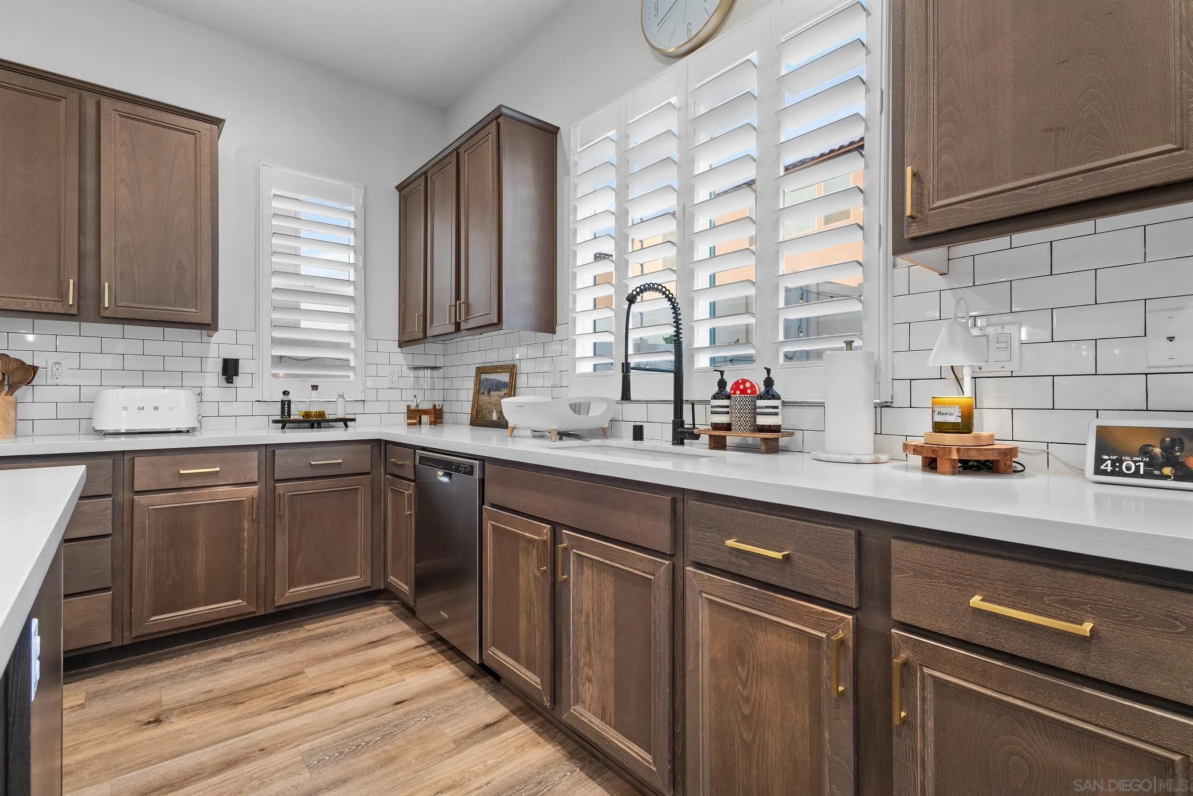 1853 Ashley Avenue Chula Vista, CA 91913 - Photo 12 of 73 a kitchen with a sink cabinets and window
