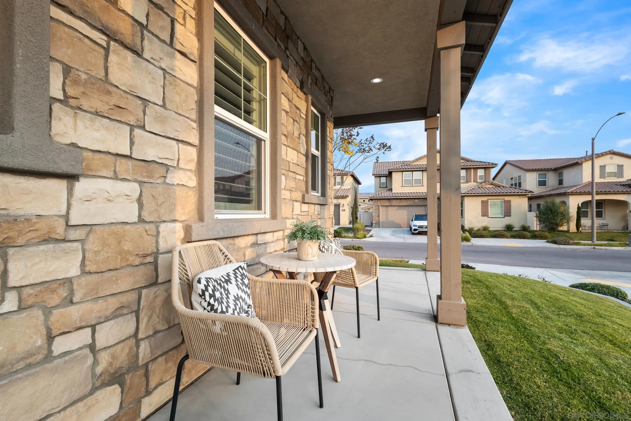1853 Ashley Avenue Chula Vista, CA 91913 - Photo 2 of 73 a view of a patio with a dining table and chairs
