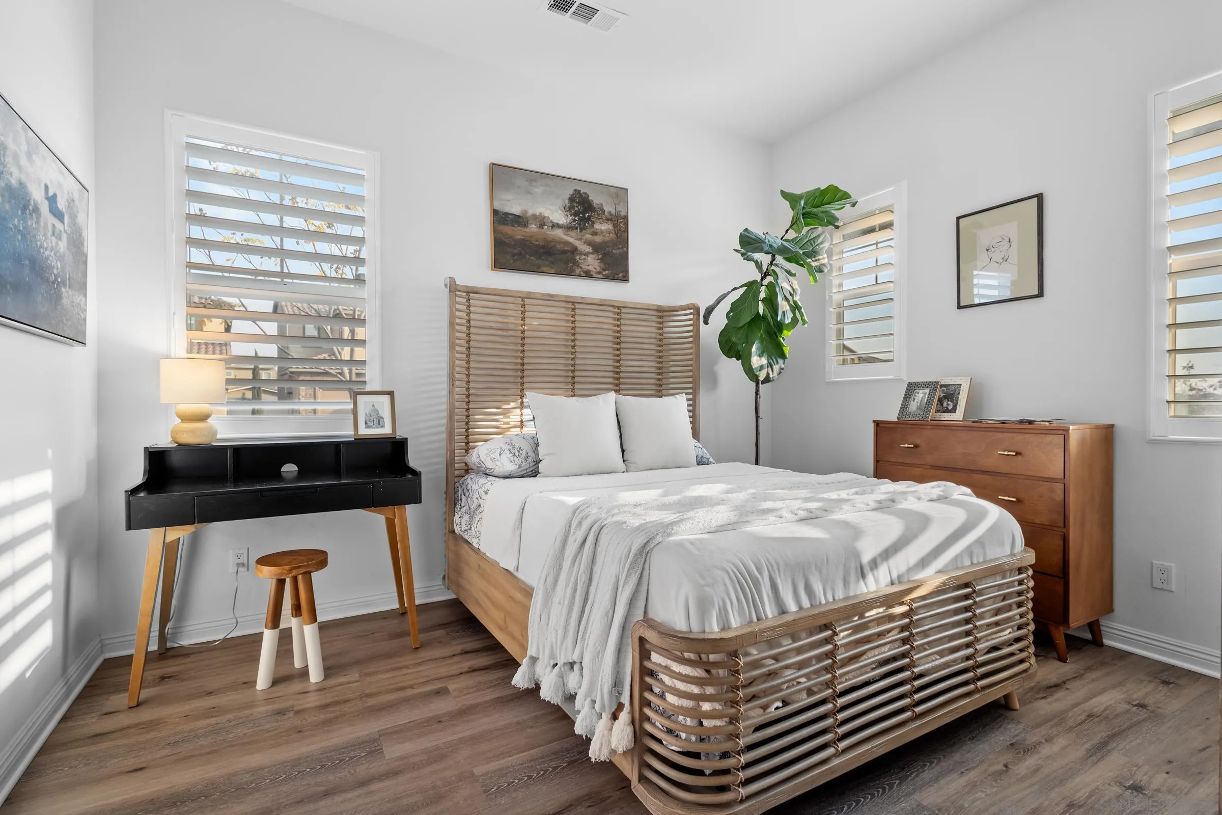 1853 Ashley Avenue Chula Vista, CA 91913 - Photo 22 of 73 a bedroom with a bed and a table