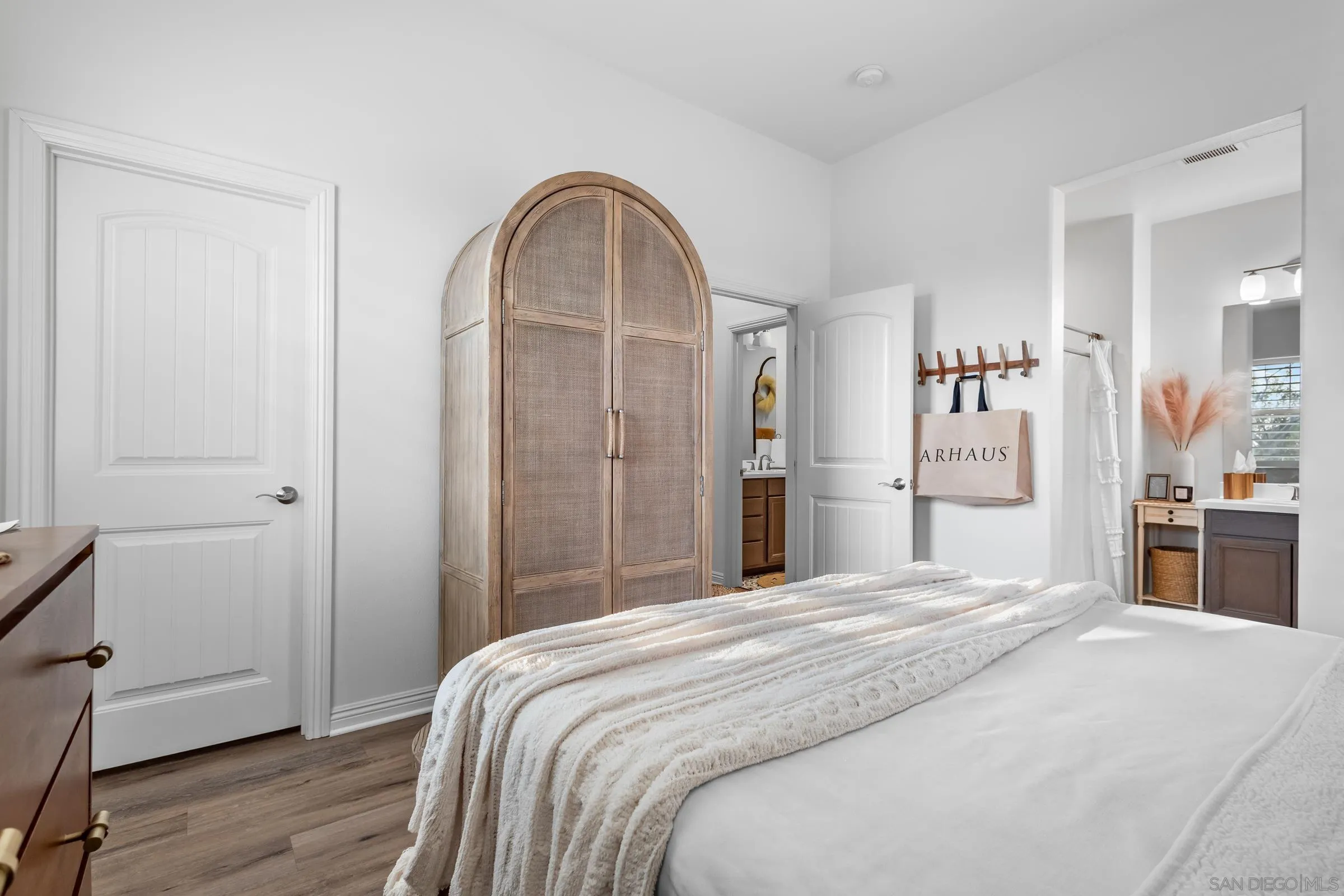 1853 Ashley Avenue Chula Vista, CA 91913 - Photo 26 of 73 a bedroom with a bed and a dresser