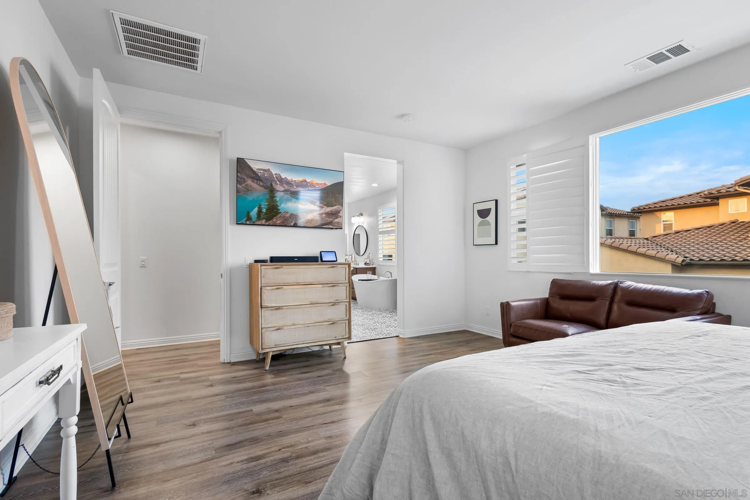 1853 Ashley Avenue Chula Vista, CA 91913 - Photo 30 of 73 a bedroom with furniture and a flat screen tv