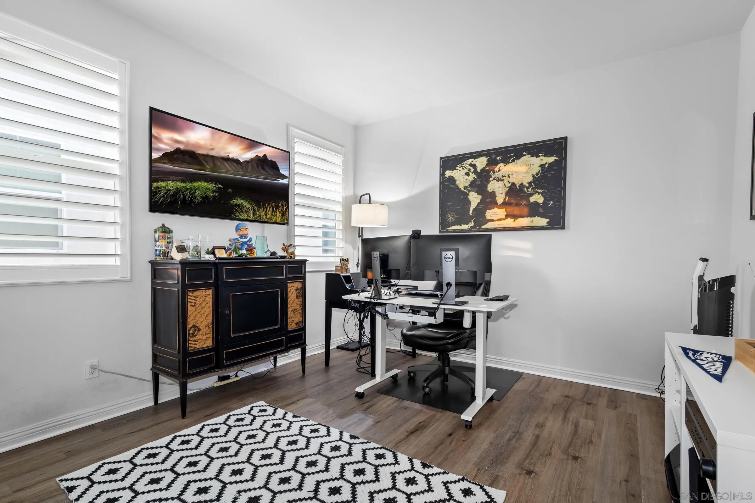 1853 Ashley Avenue Chula Vista, CA 91913 - Photo 44 of 73 a view of a workspace with furniture and a window