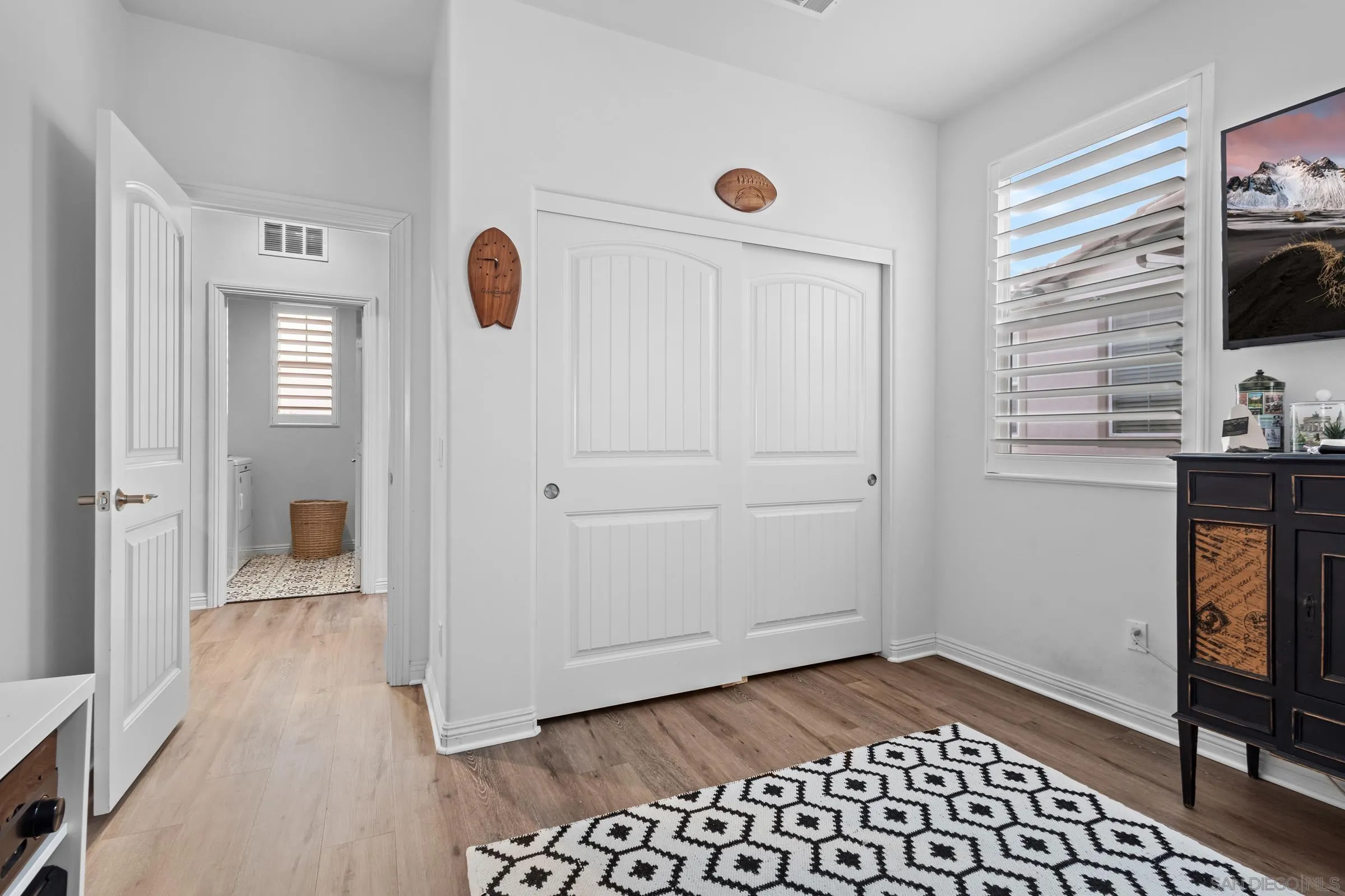 1853 Ashley Avenue Chula Vista, CA 91913 - Photo 45 of 73 a view of a livingroom with wooden floor and a window