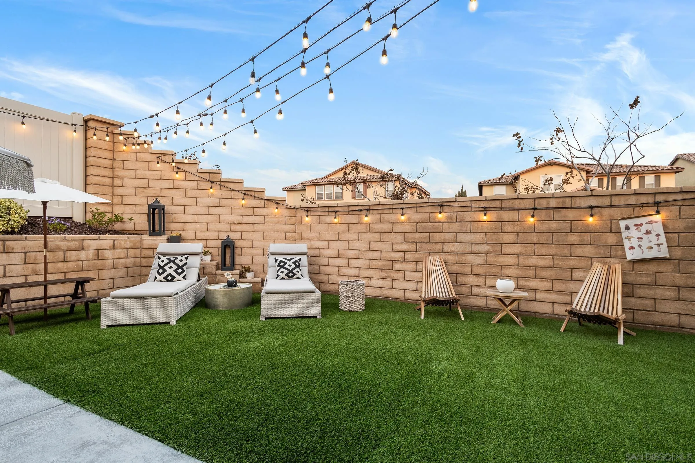 1853 Ashley Avenue Chula Vista, CA 91913 - Photo 53 of 73 a view of a chairs in backyard of the house