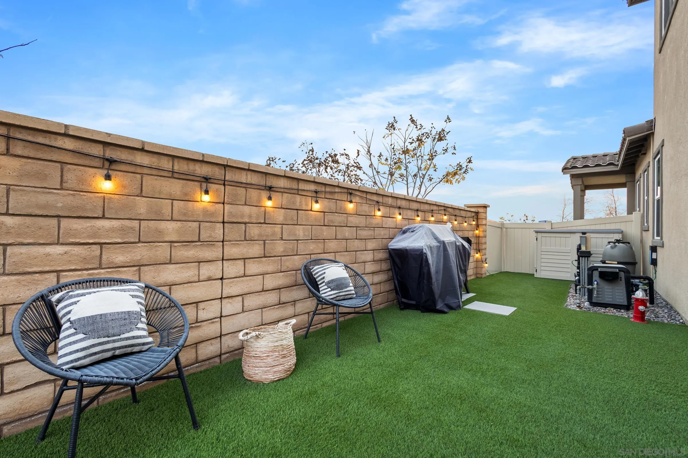 1853 Ashley Avenue Chula Vista, CA 91913 - Photo 54 of 73 a backyard of a house with table and chairs